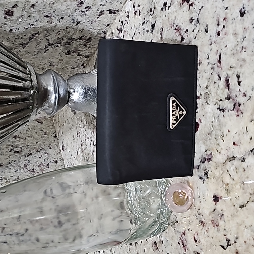 Prada saffiano and nylon wallet bit or wear on nylon see photos